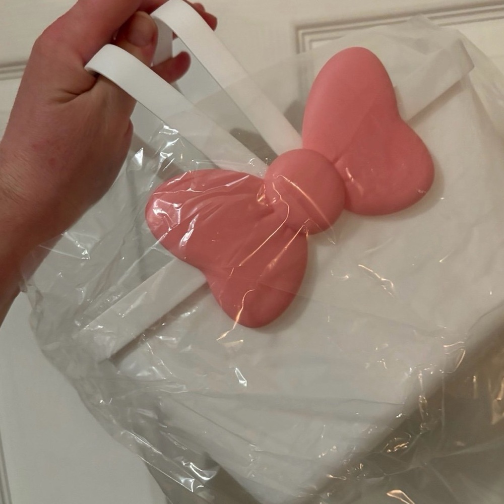 Pink Bow on White Plastic Handle Basket